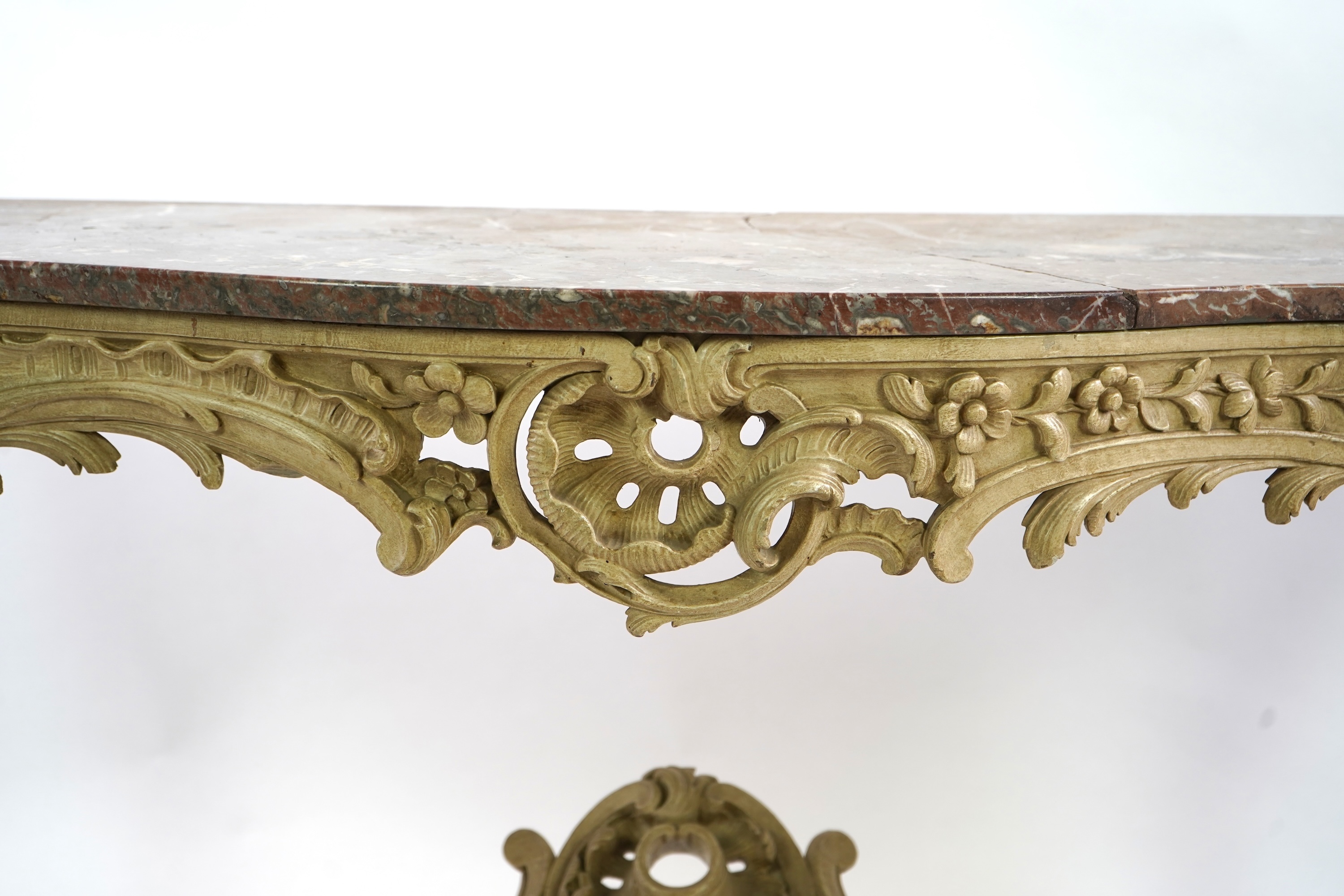 A 19th century Louis XV style marble topped painted serpentine console table